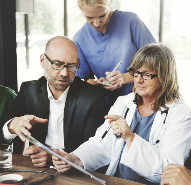 doctors and manager having discussion