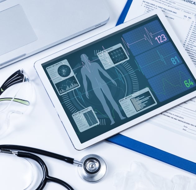stethoscope and tablet with data